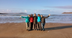 Guests enjoying a beach in November